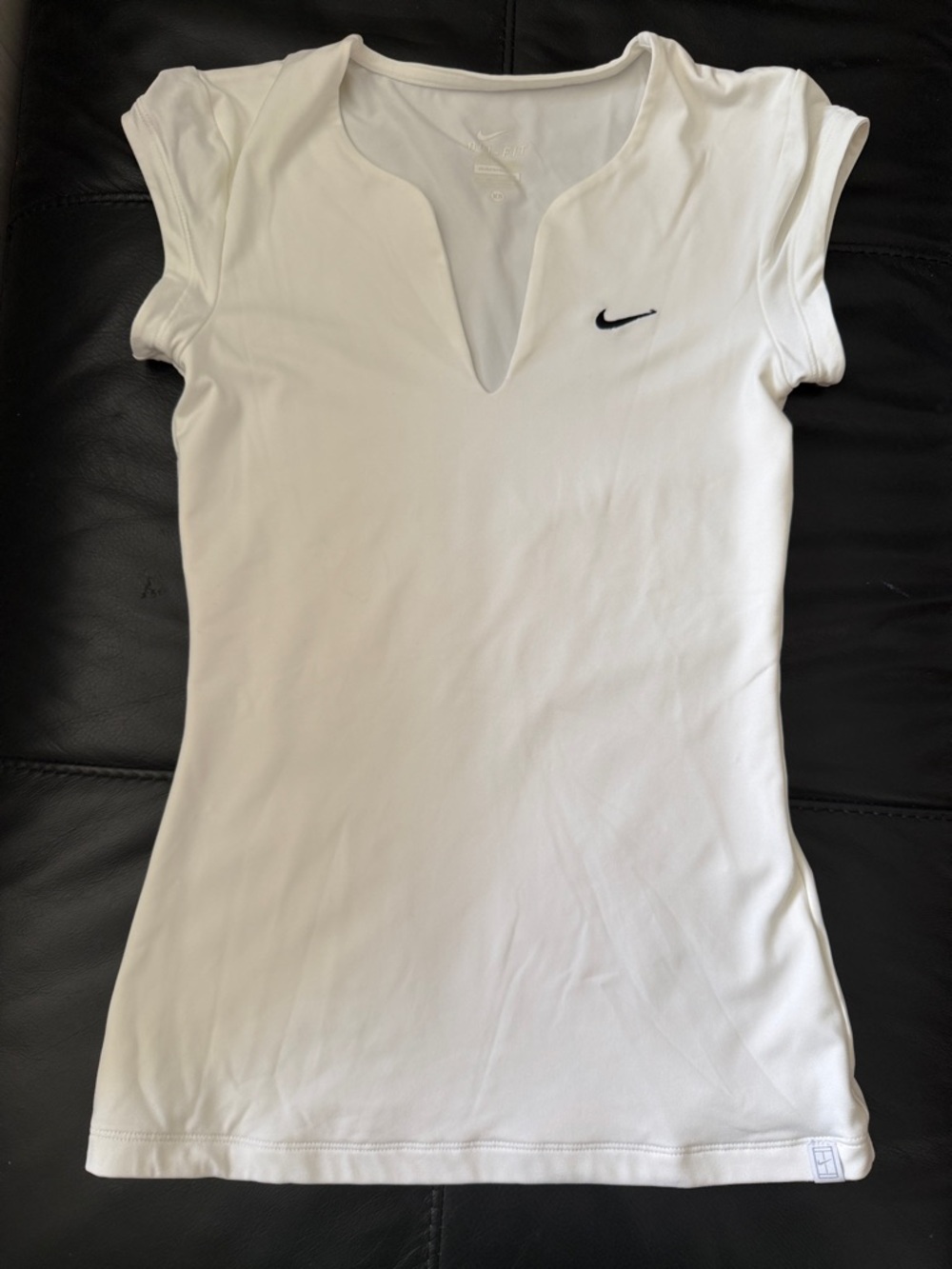 Nike White Women's Short Sleeve V-Notch Athletic Tee with Black Swoosh